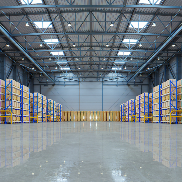 High-bay distribution warehouse with racking and loading docks